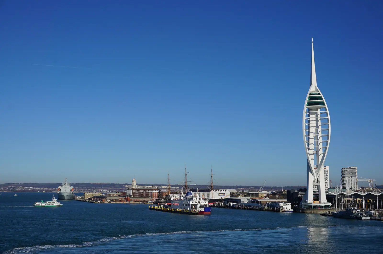 Portsmouth waterfront and the Spinnaker Tower seen across the Solent Portsmouth waterfront and the Spinnaker Tower seen across the Solent